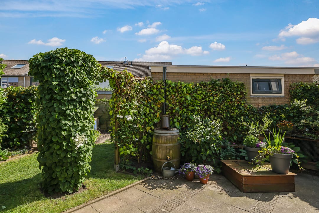 Spacious Corner Family Home with 5 Bedrooms, Carport and Sunny South-Facing Garden in Heteren — 53