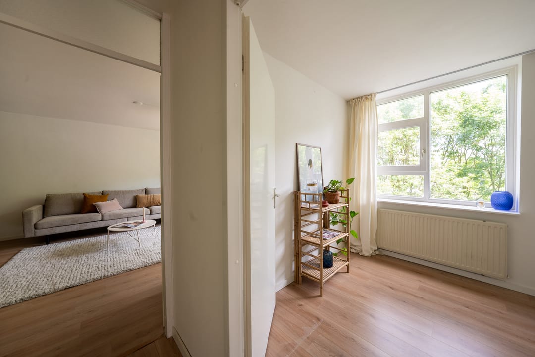 Spacious and Light Apartment with Canal View and Private Land in Diemen — 32