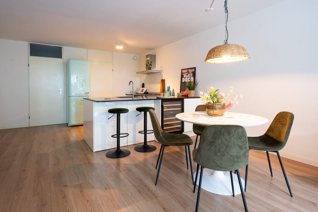 Spacious and Light Apartment with Canal View and Private Land in Diemen — 13