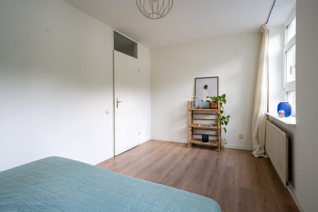 Spacious and Light Apartment with Canal View and Private Land in Diemen — 17