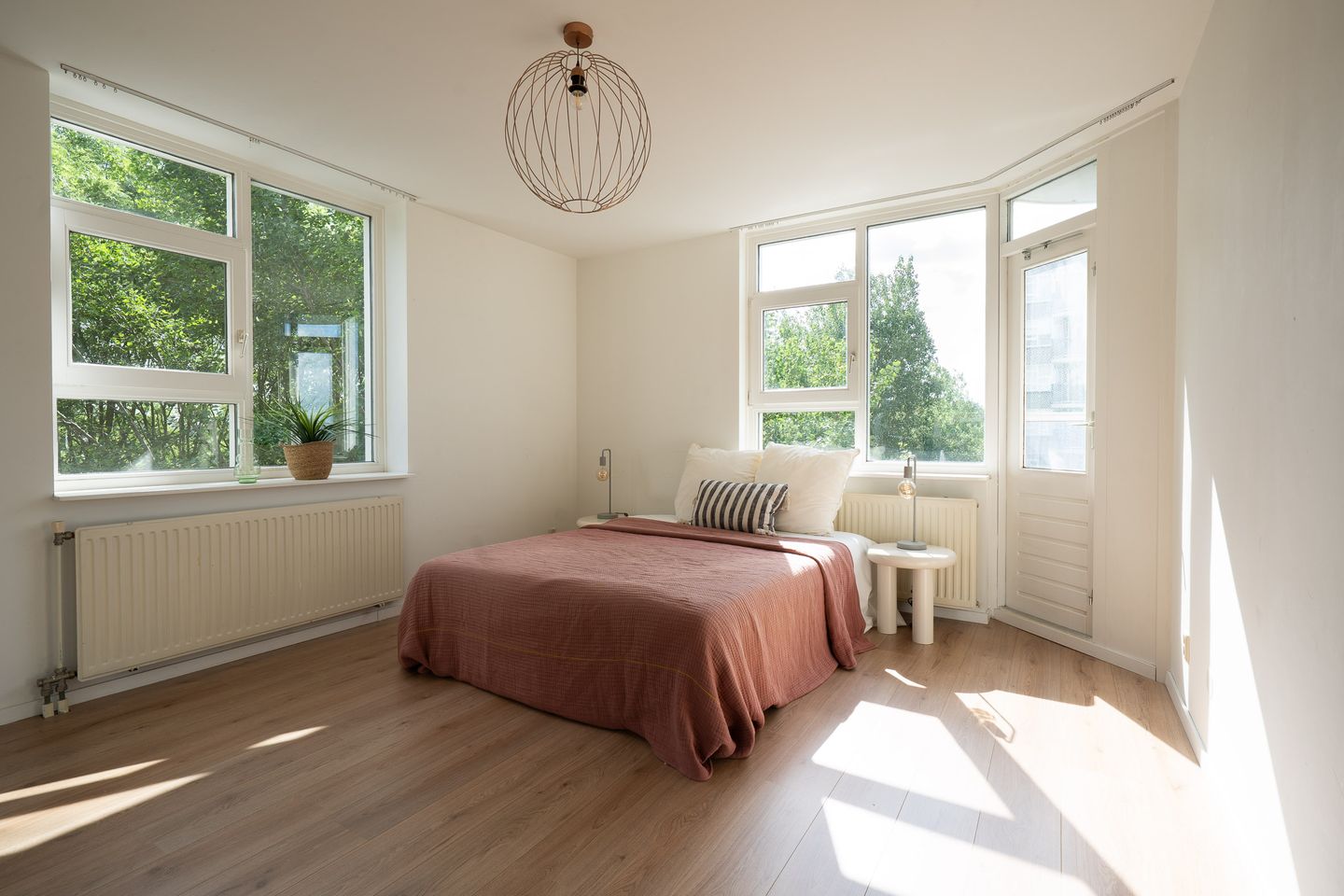 Spacious and Light Apartment with Canal View and Private Land in Diemen — 14