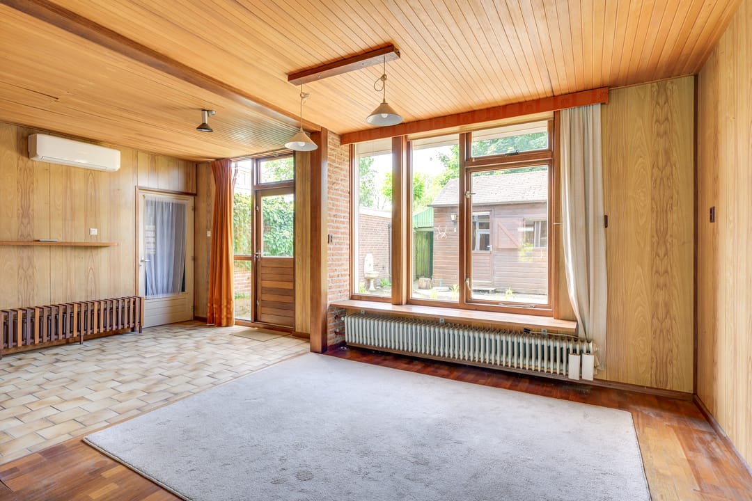 Spacious semi-detached family home with four bedrooms, garage, and sunny southwest garden in a quiet green location near Uden center — 11