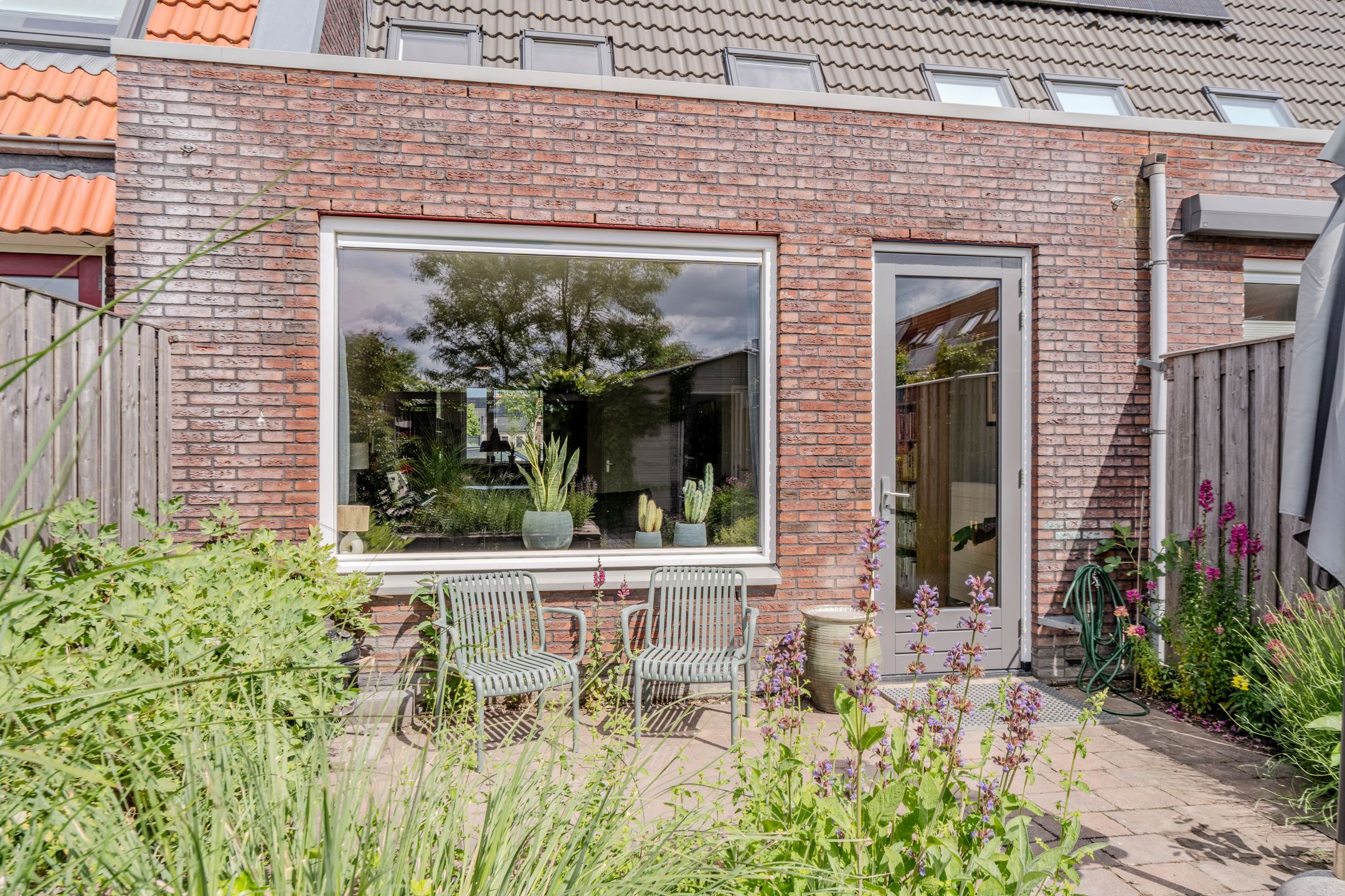 Modern and energy-efficient terraced house with unobstructed water views in Westerdel — 27