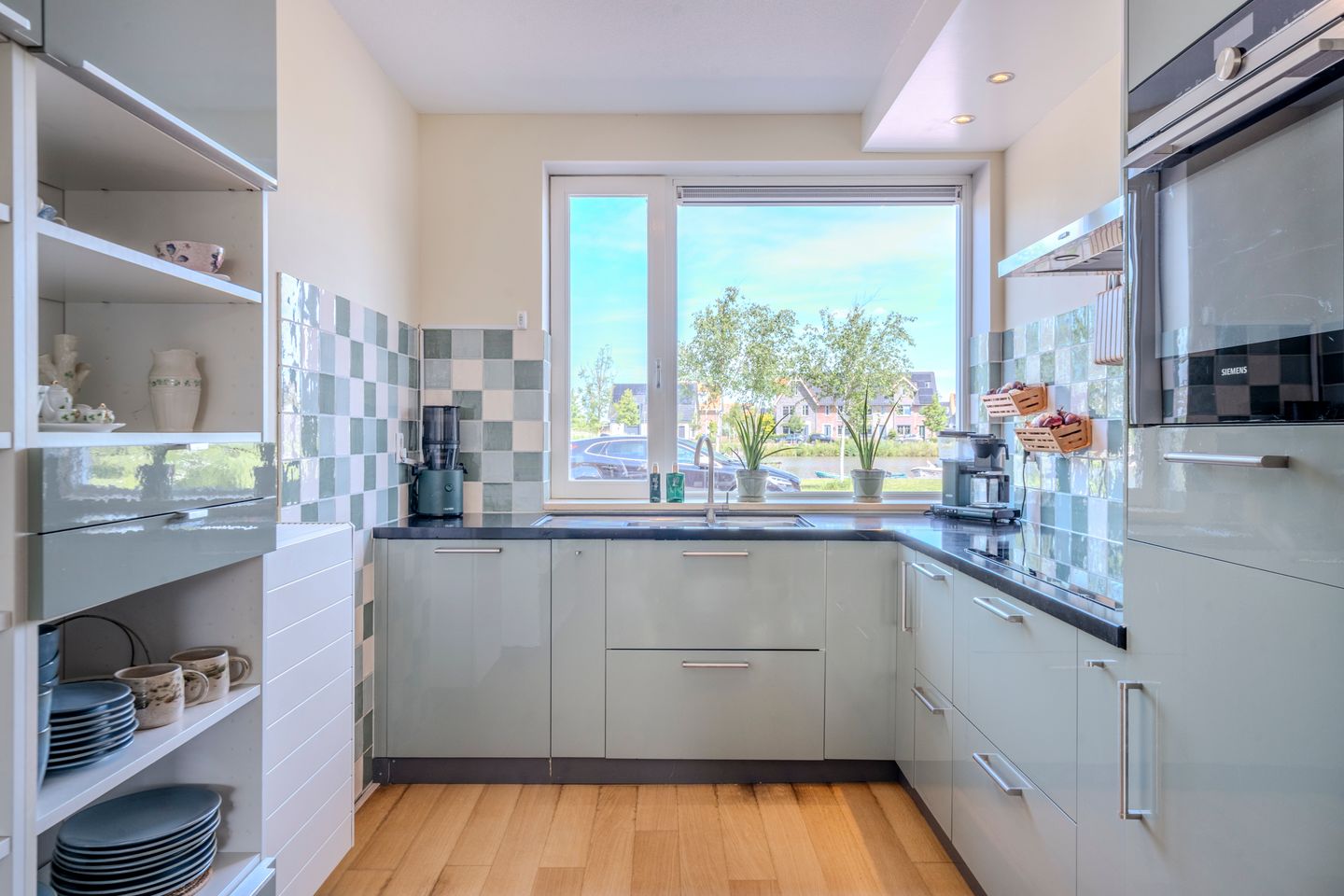 Modern and energy-efficient terraced house with unobstructed water views in Westerdel — 19
