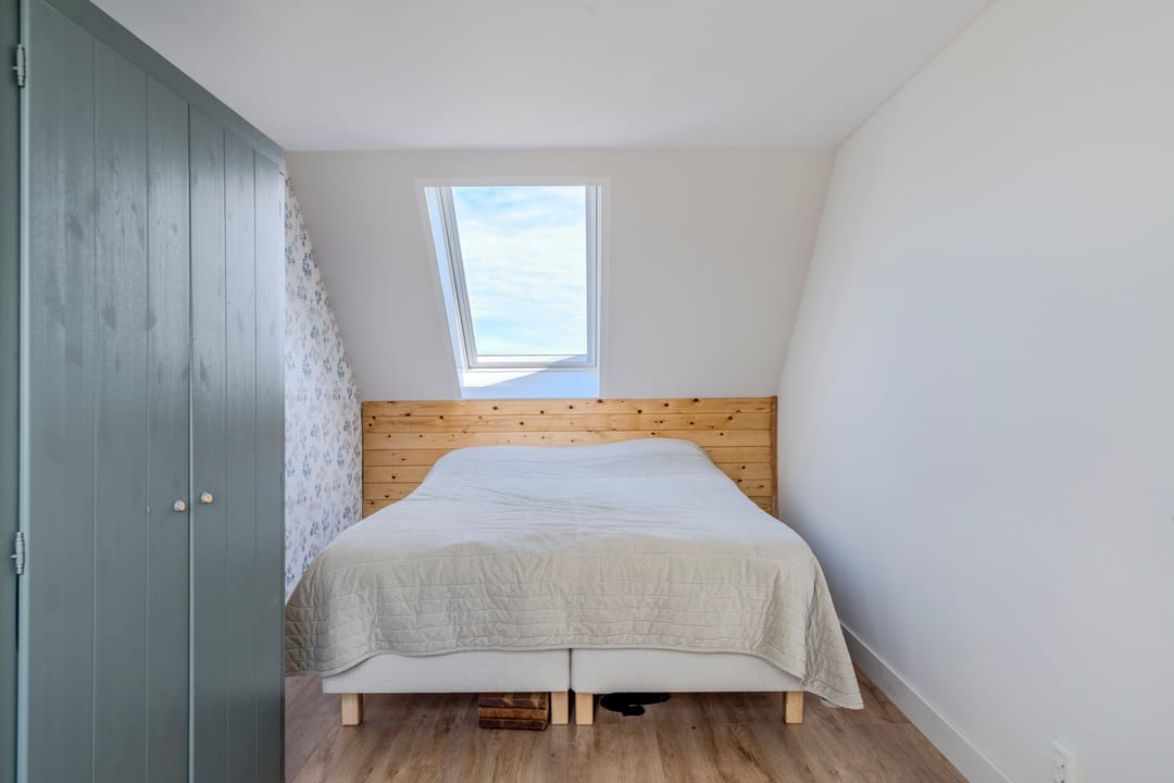 Modern and energy-efficient terraced house with unobstructed water views in Westerdel — 47