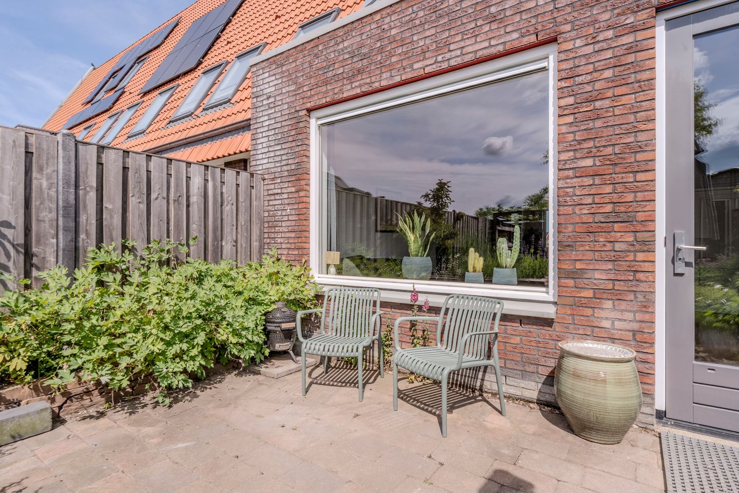 Modern and energy-efficient terraced house with unobstructed water views in Westerdel — 25