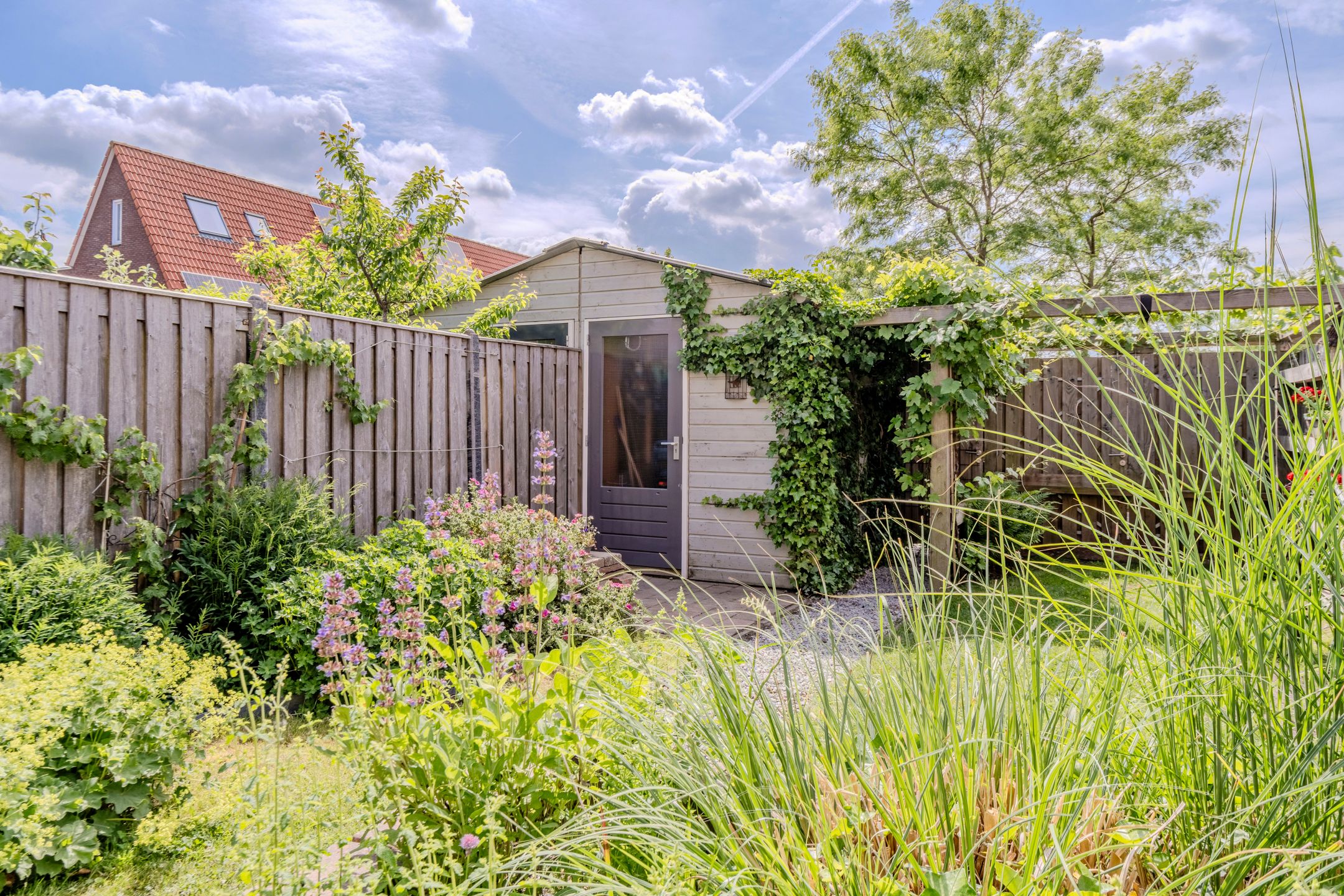 Modern and energy-efficient terraced house with unobstructed water views in Westerdel — 24