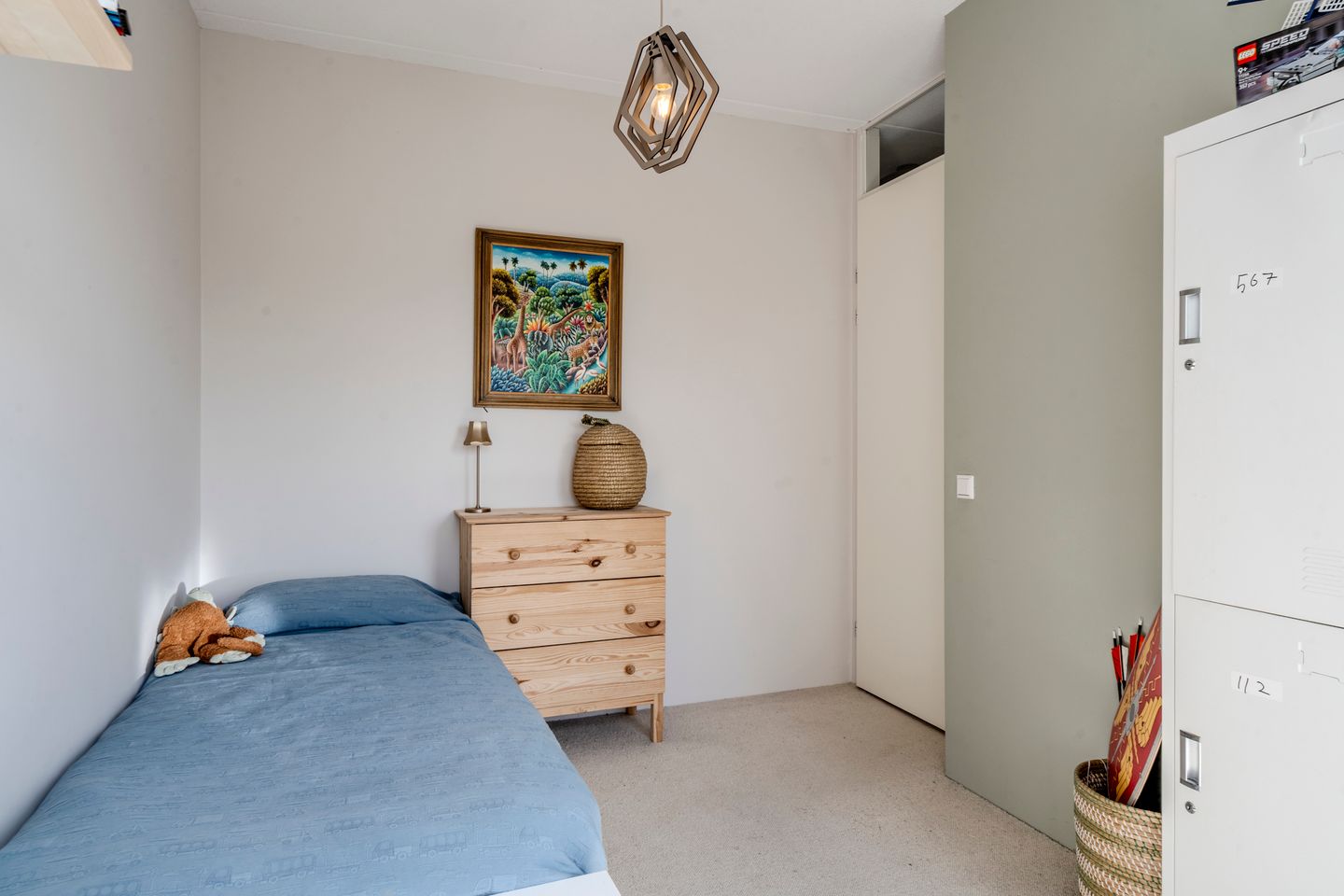 Modern and energy-efficient terraced house with unobstructed water views in Westerdel — 35