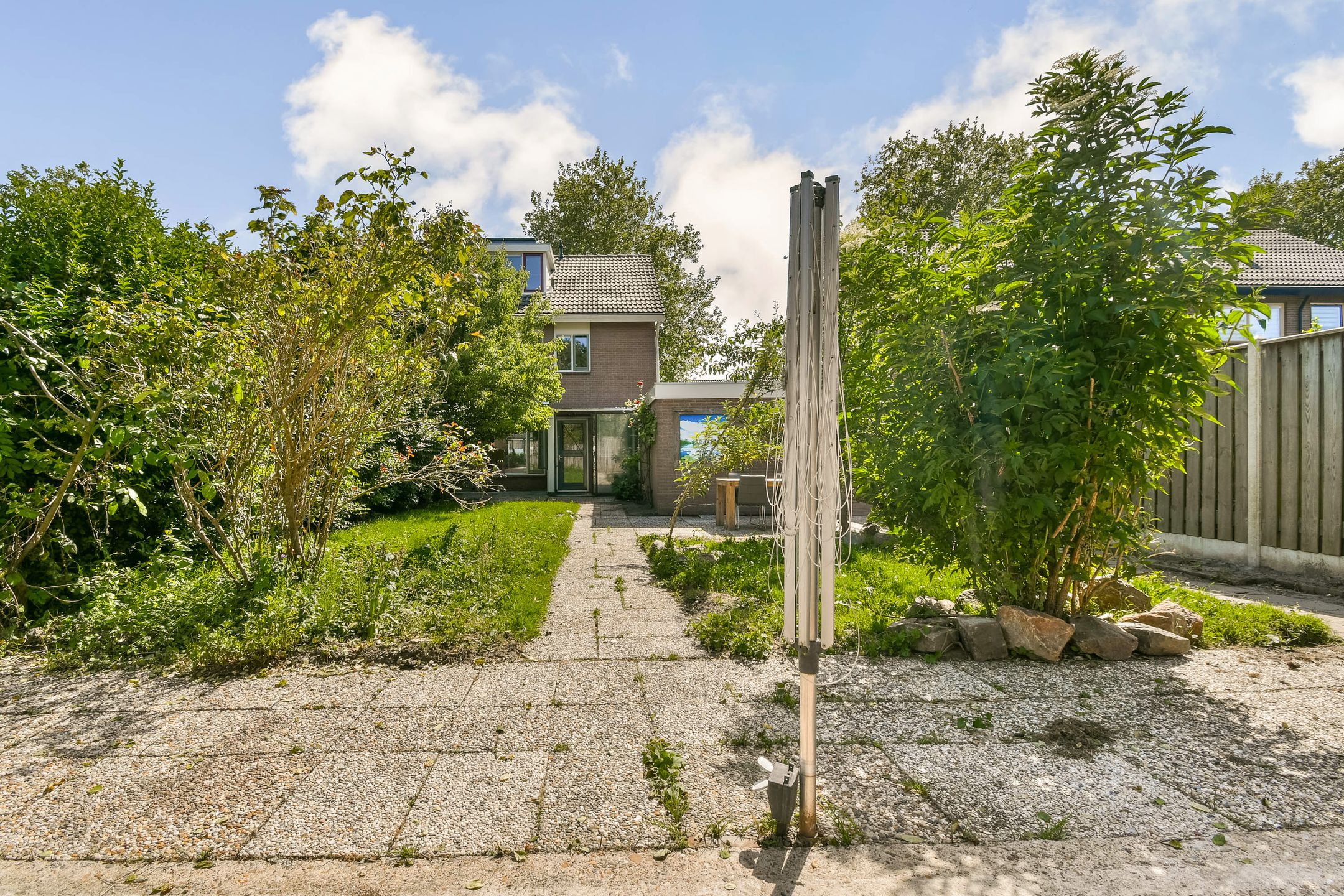 Modernized Semi-Detached Home with Five Bedrooms and Private Garden — 12