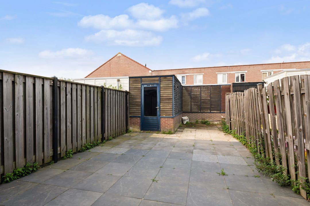 Terraced family home with southwest-facing garden in Reigersbos — 16