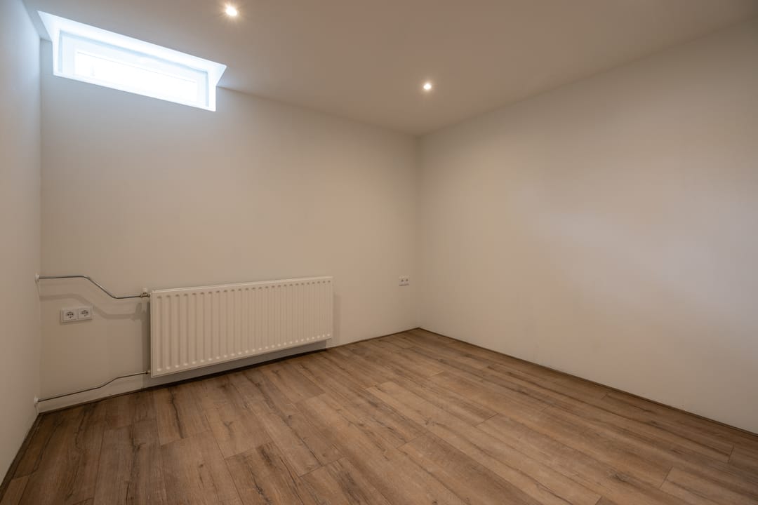 Renovated Four-Room Apartment with Spacious Layout in Popular Rotterdam Neighborhood — 22