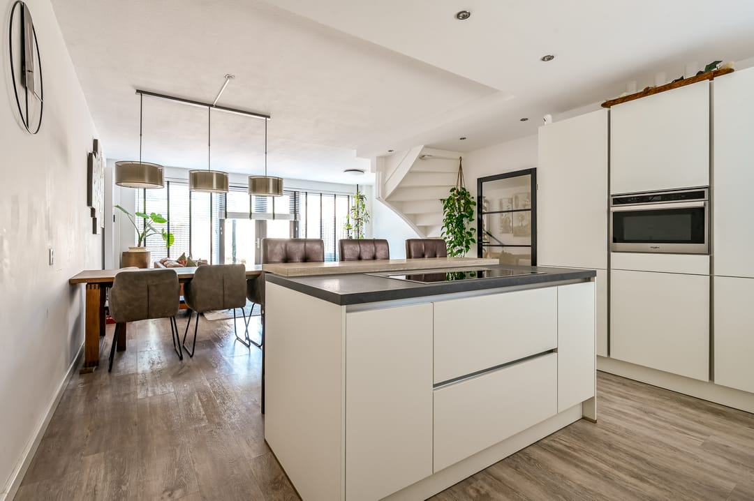 Spacious Terraced Home with Two Dormers and Private Parking in Quiet Lelystad Neighborhood — 11