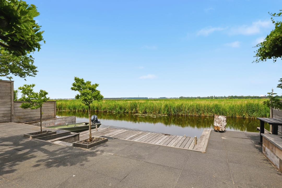 Luxurious Waterfront Semi-Detached Home with Panoramic Meadow Views — 16