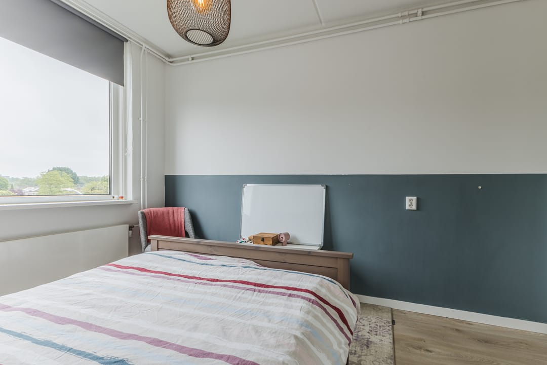 Spacious Top Floor Apartment with Three Balconies and Green Views — 28