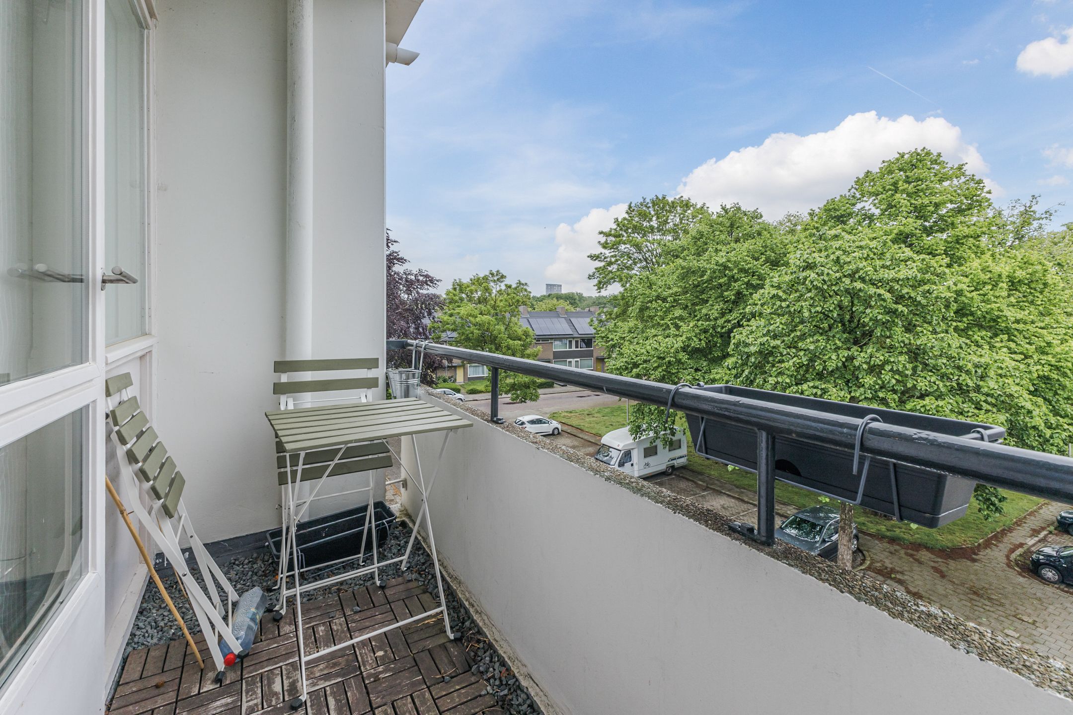 Spacious Top Floor Apartment with Three Balconies and Green Views — 36