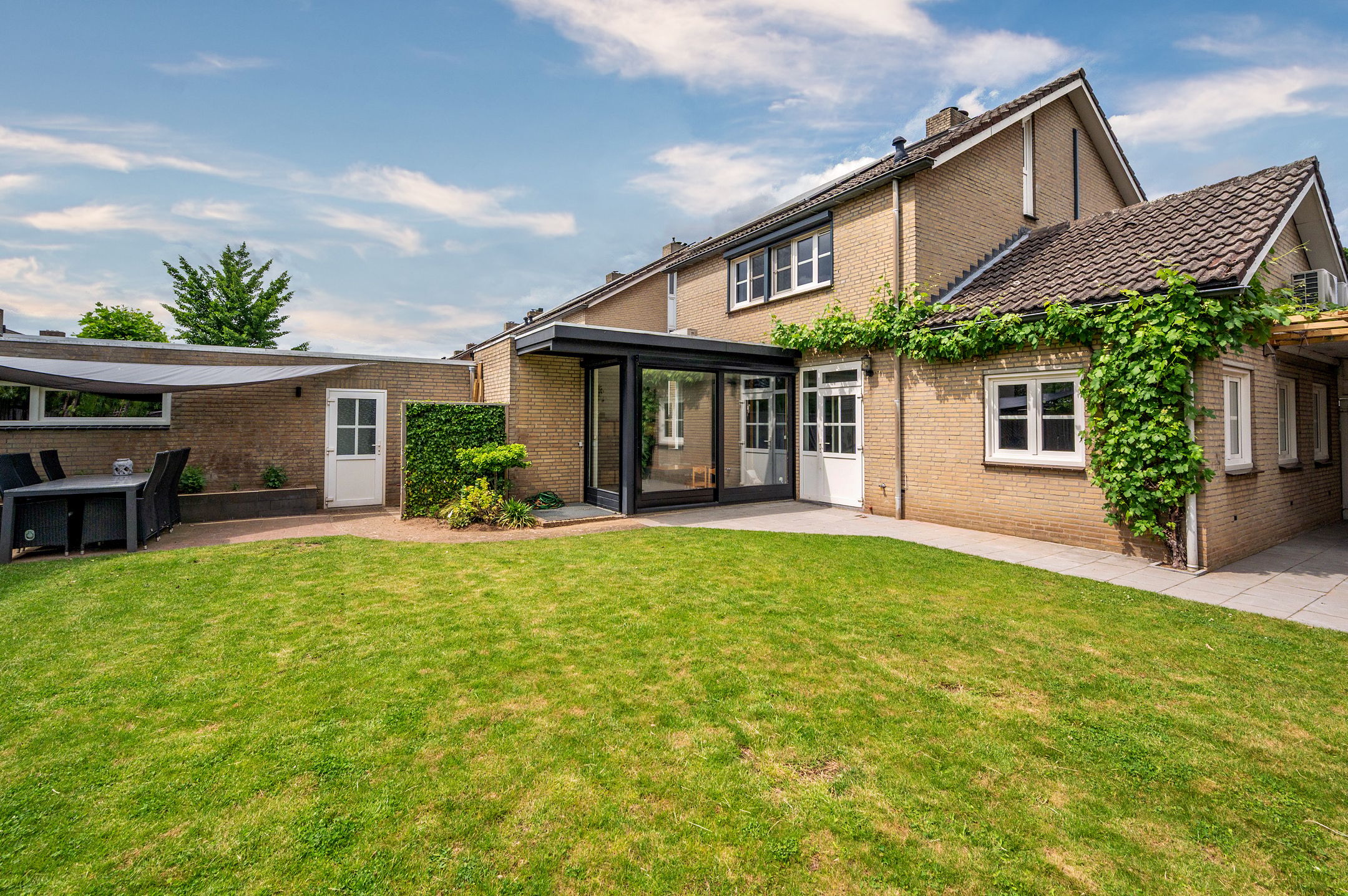 Spacious Detached Home with South-Facing Garden and Carport in Quiet Village Setting — 48