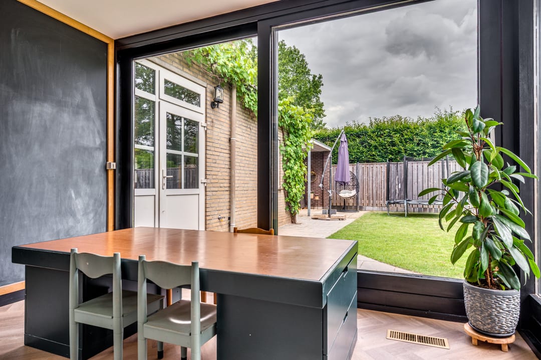 Spacious Detached Home with South-Facing Garden and Carport in Quiet Village Setting — 32