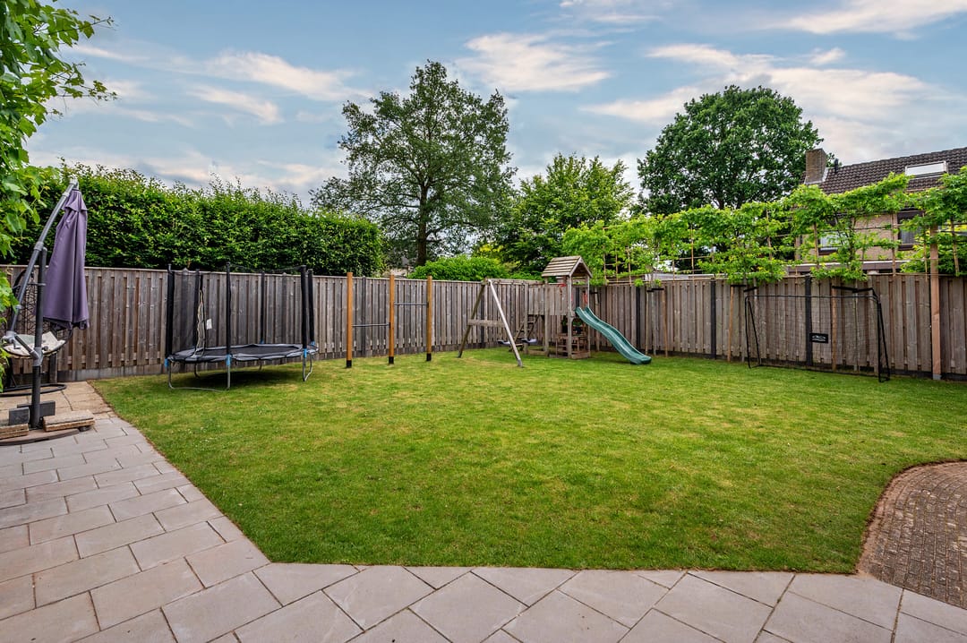Spacious Detached Home with South-Facing Garden and Carport in Quiet Village Setting — 56