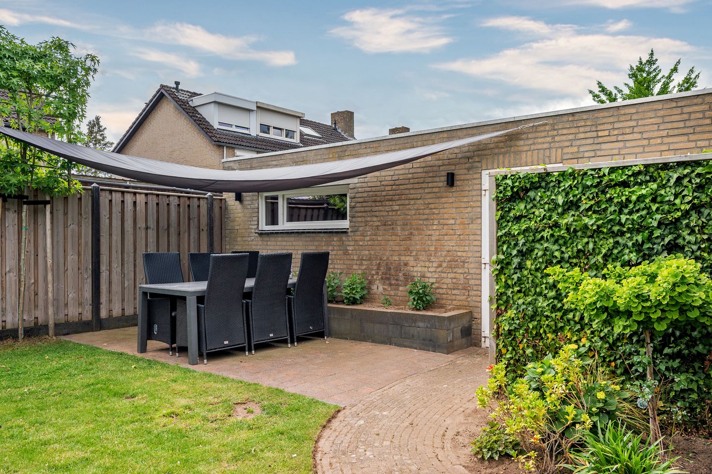 Spacious Detached Home with South-Facing Garden and Carport in Quiet Village Setting — 59