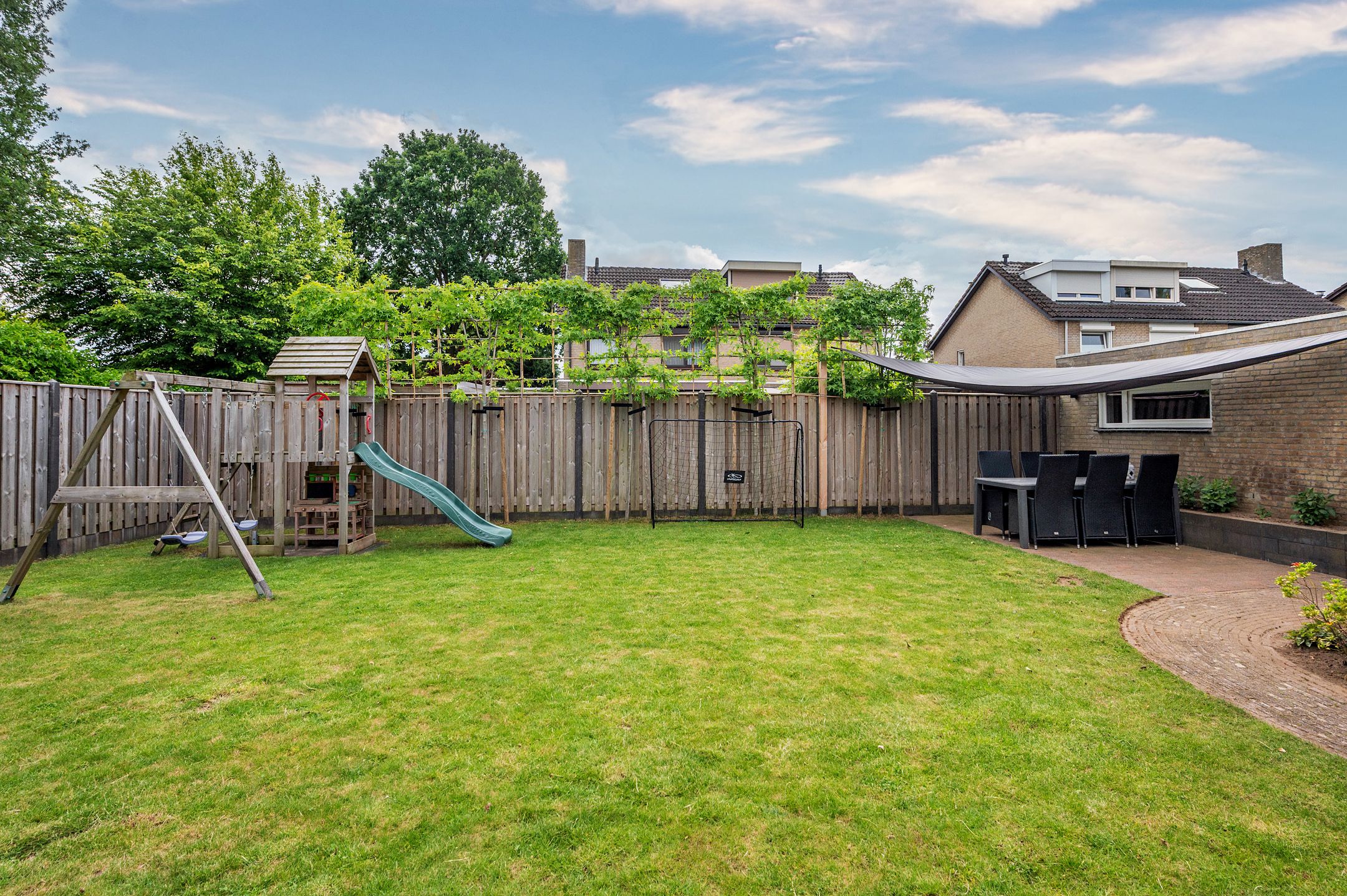 Spacious Detached Home with South-Facing Garden and Carport in Quiet Village Setting — 57
