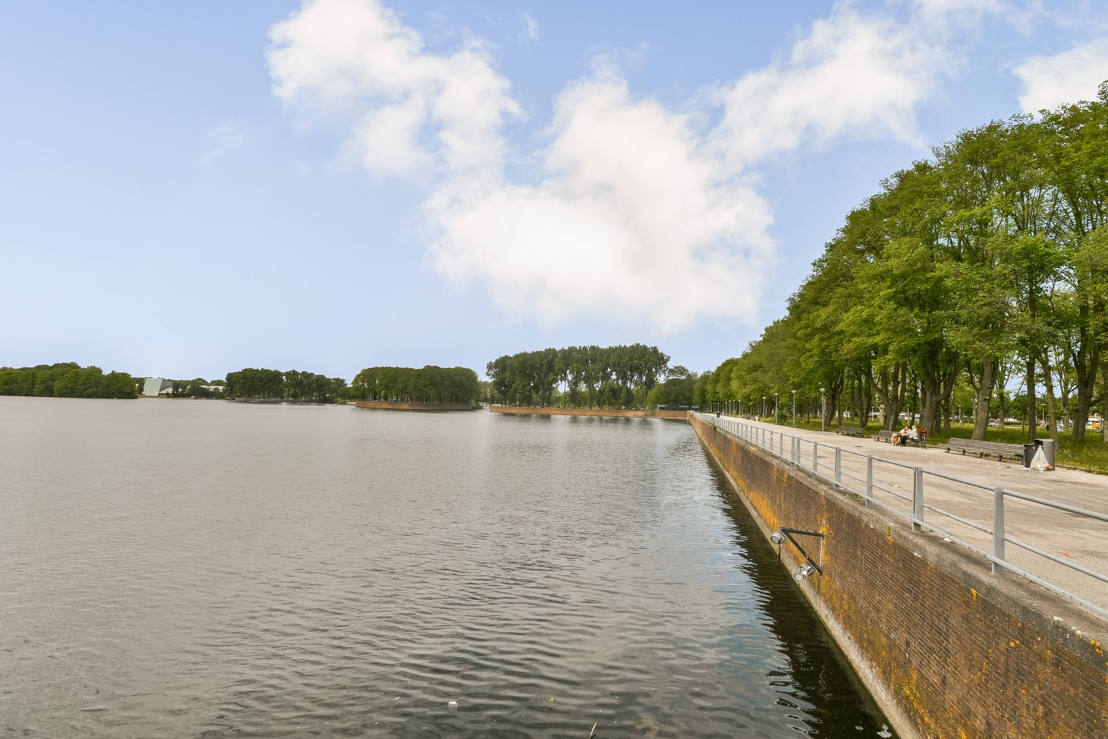 Bright 11th Floor Apartment with Panoramic Sloterplas Views and Spacious West-Facing Balcony — 18