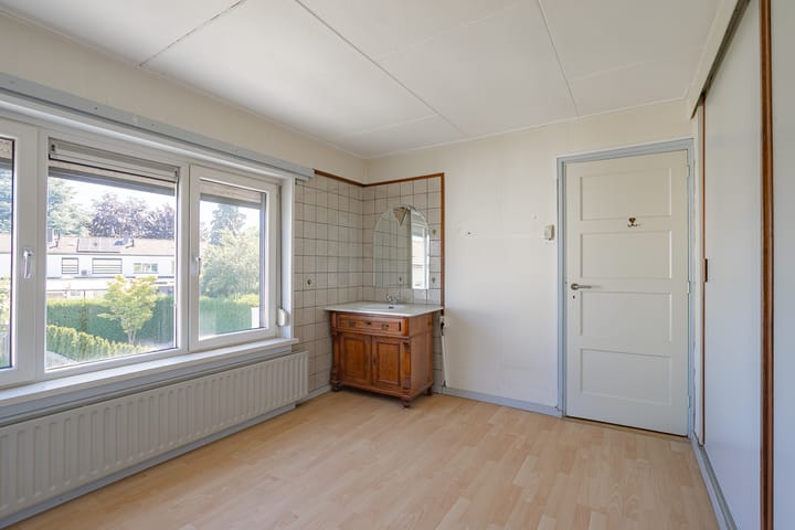 Twee-onder-één-kap te koop: Woensdagstraat 13, Heerlen
