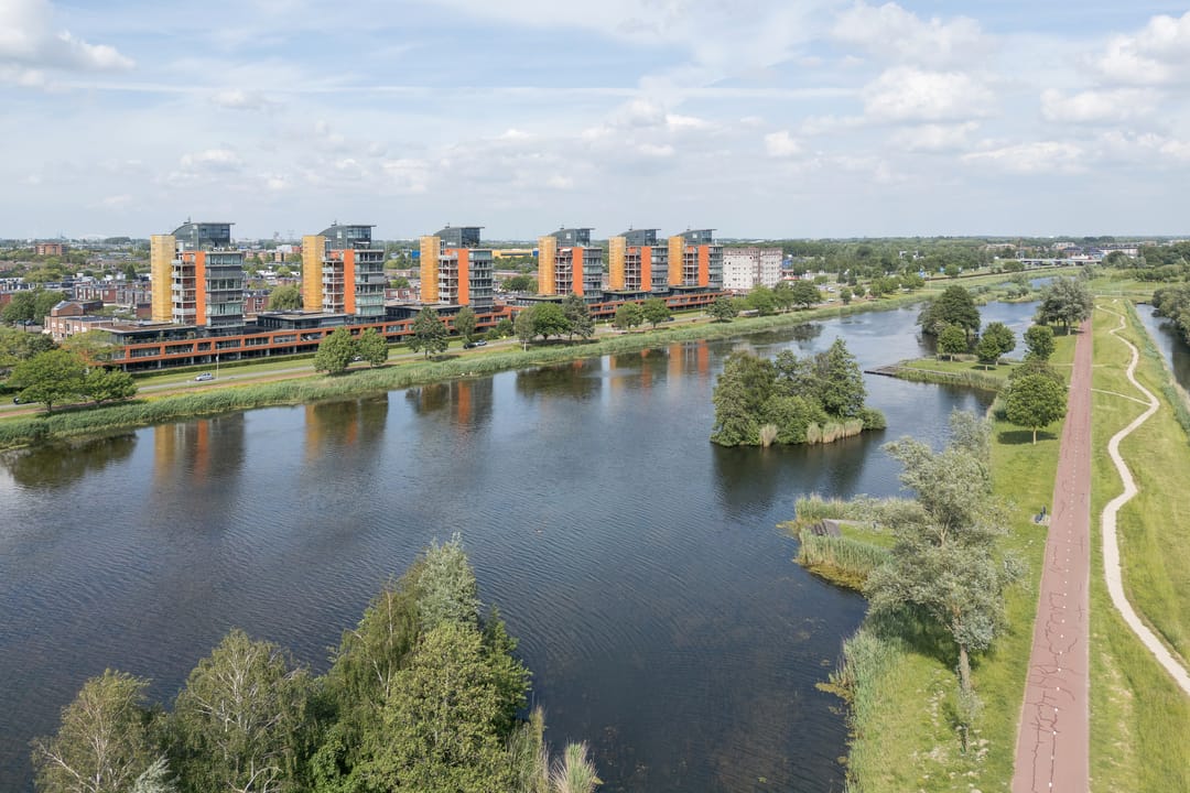 Spacious Corner Apartment with Panoramic Water and Polder Views — 32