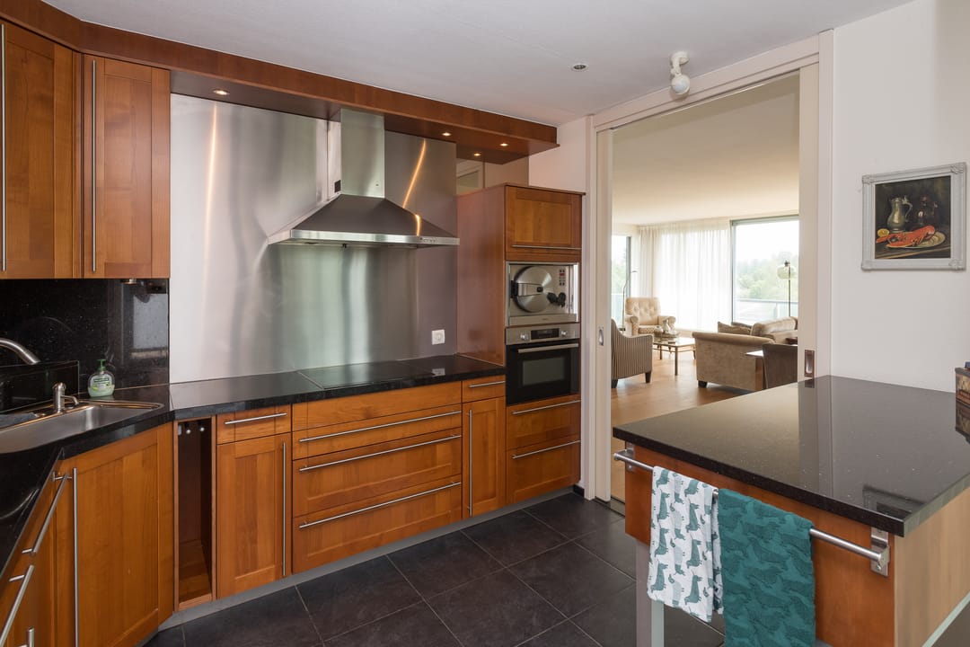 Spacious Corner Apartment with Panoramic Water and Polder Views — 13