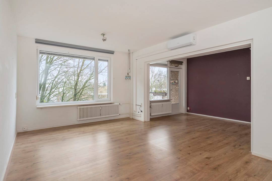Spacious Three-Bedroom Apartment with South-Facing Balcony and Elevator in Green Setting — 16
