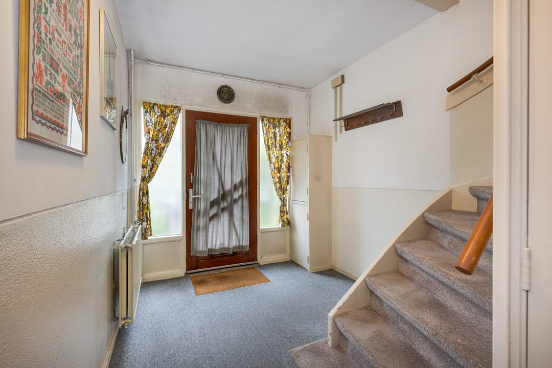 Spacious Corner Home with Garage and Expansion Potential — 8