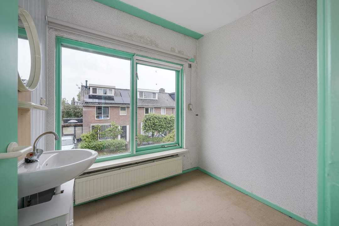 Spacious Corner Home with Garage and Expansion Potential — 22