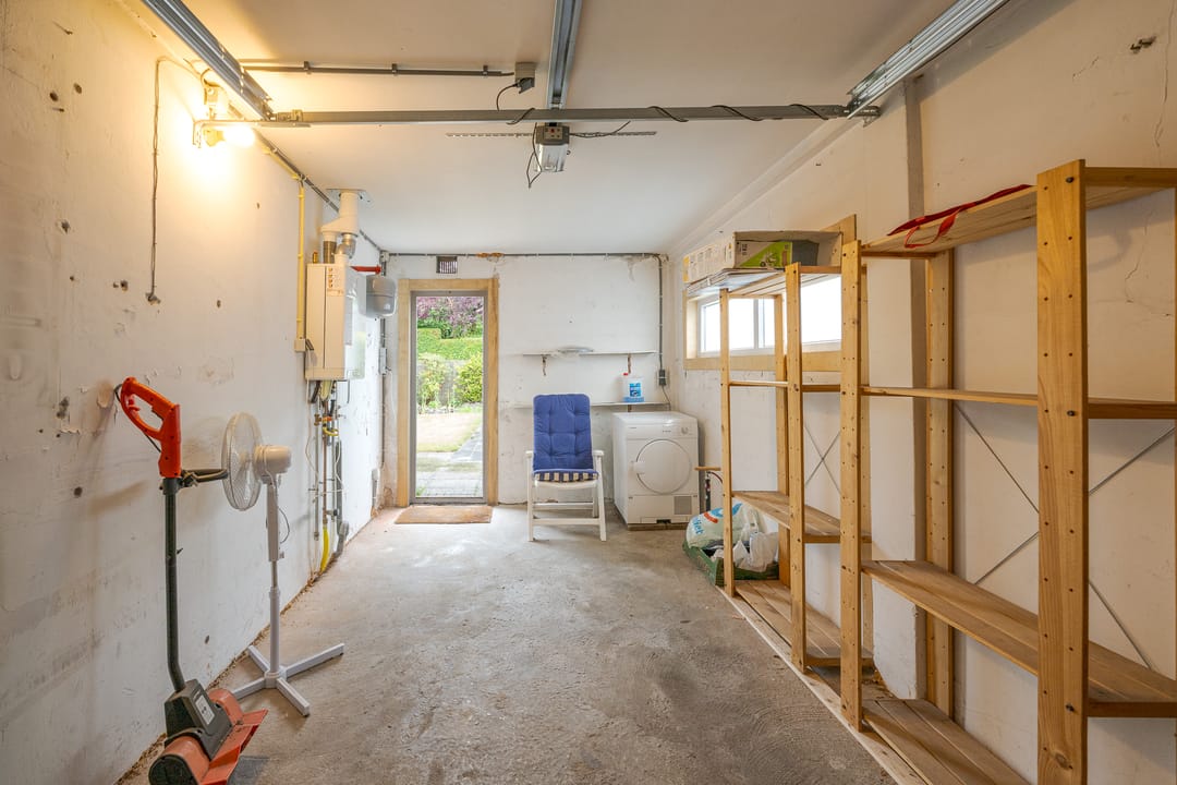 Spacious Corner Home with Garage and Expansion Potential — 31