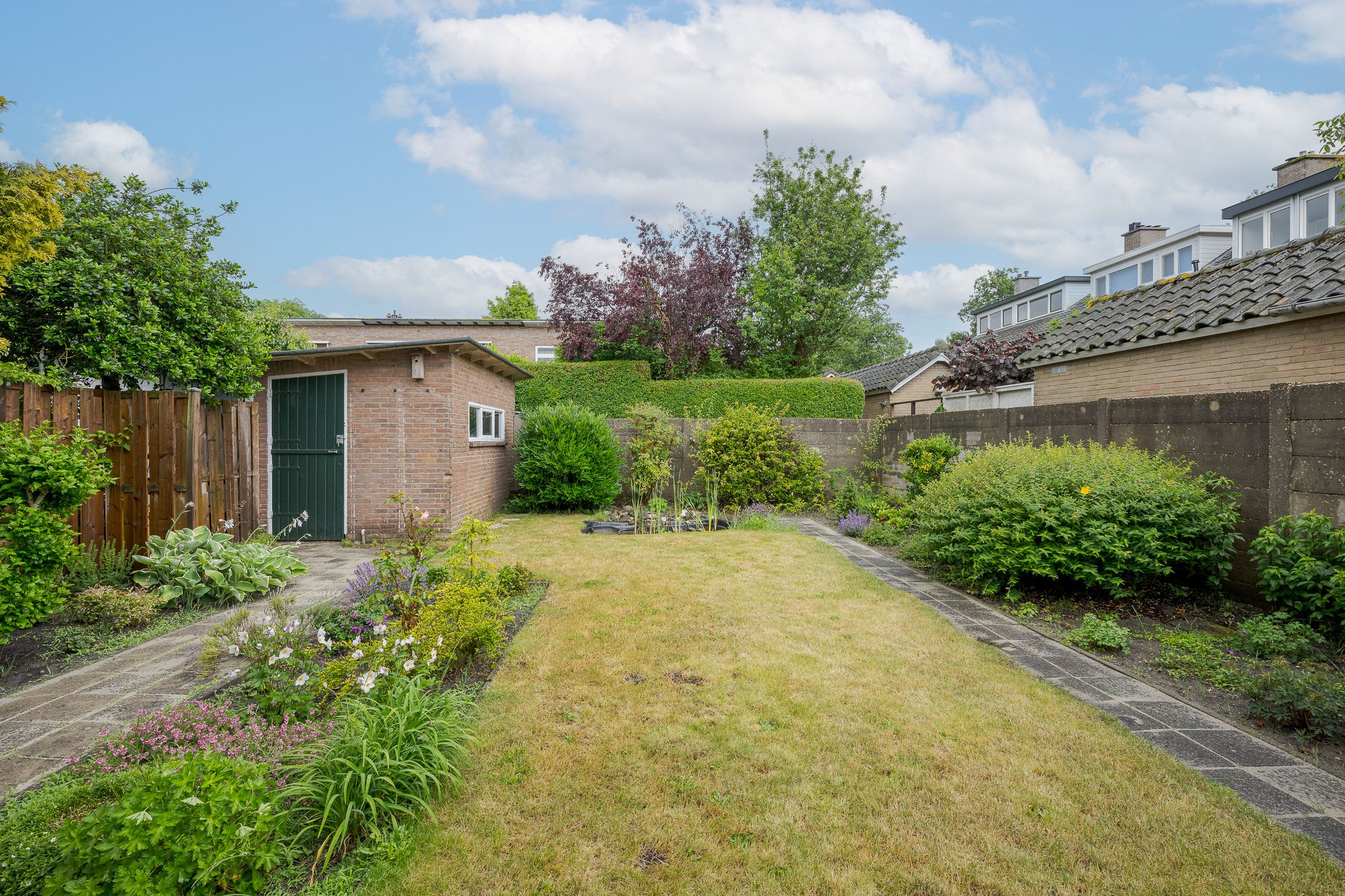 Spacious Corner Home with Garage and Expansion Potential — 27