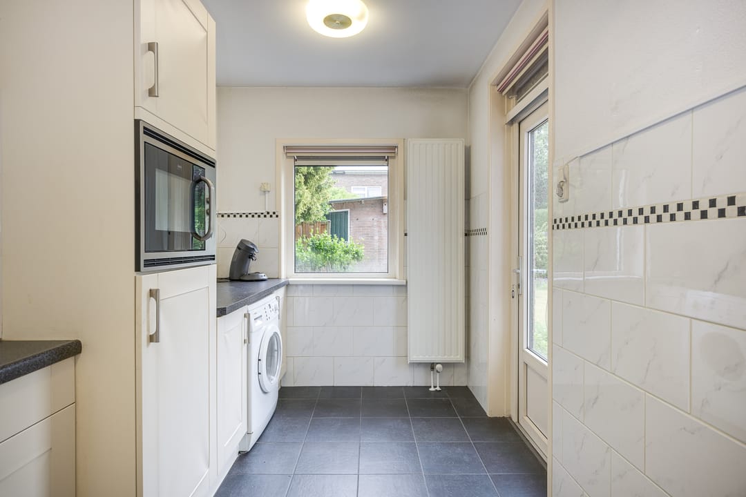 Spacious Corner Home with Garage and Expansion Potential — 17