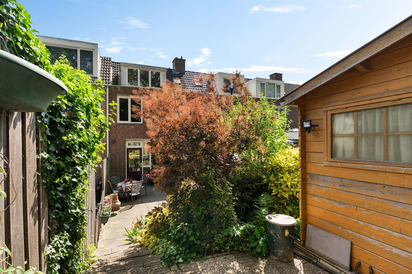 Spacious Family Home with Four Bedrooms and Deep Backyard in Quiet Green Neighborhood — 25