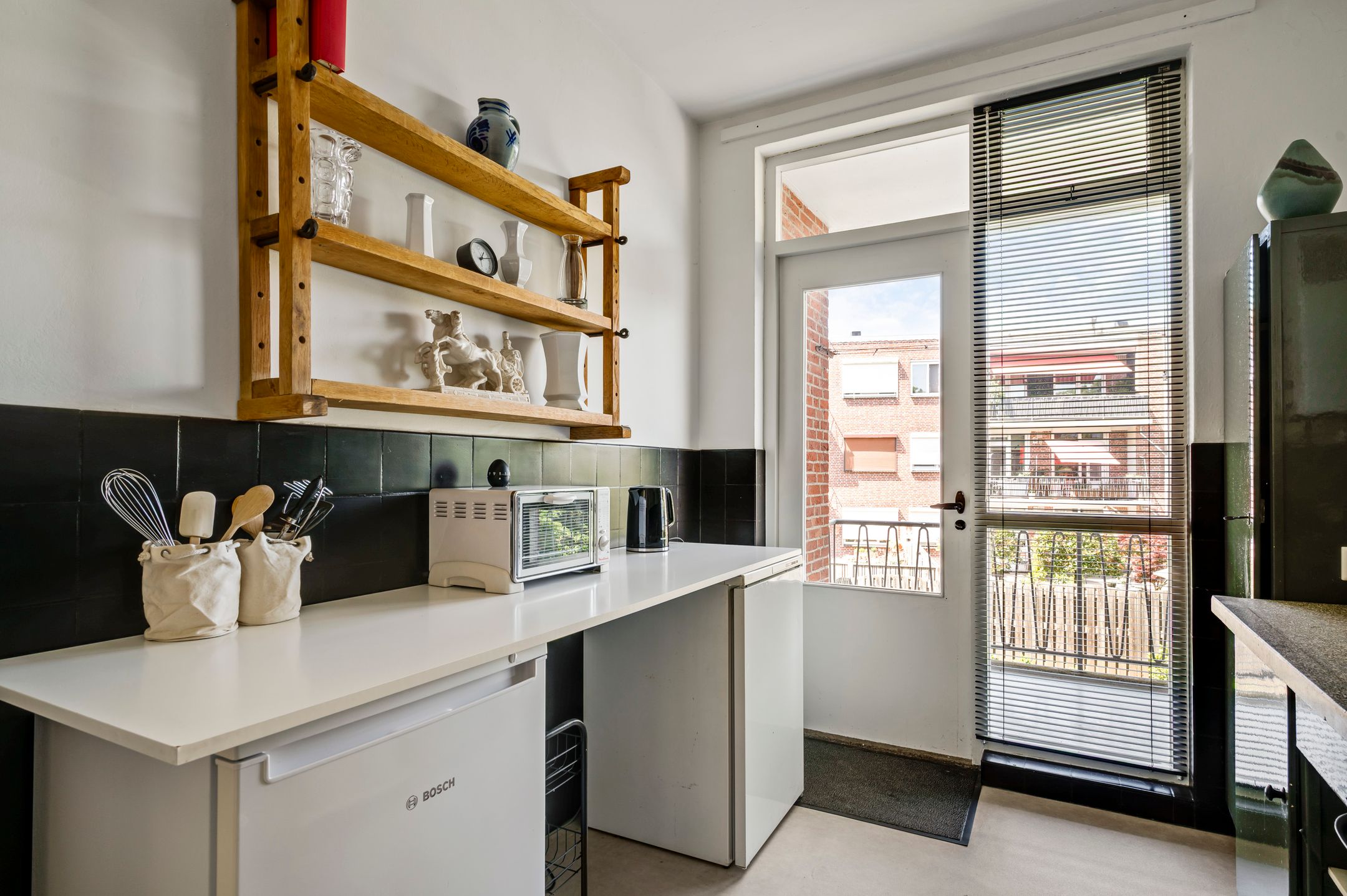 Bright First Floor Apartment with Balcony and Private Storage in Roermond — 18