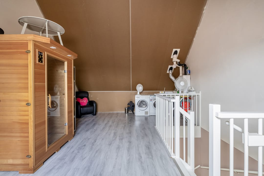 Modern Energy-Efficient Terraced Home with Three Living Levels in Zuidland — 38