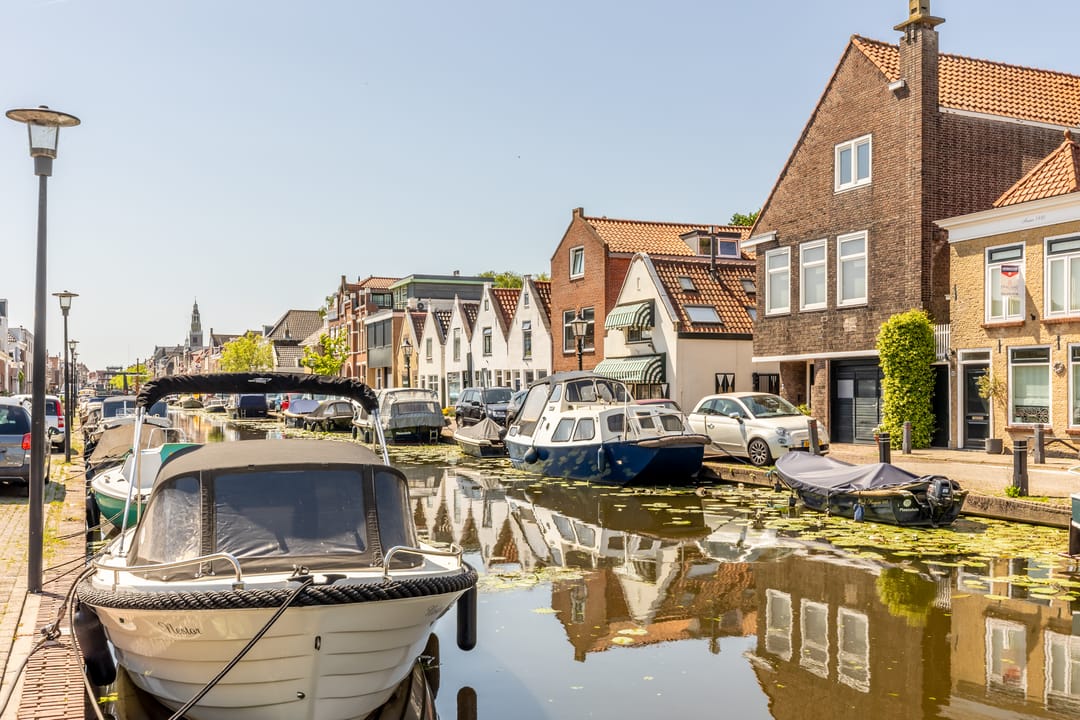 Historic Wine Warehouse Converted into Unique Canal-Side Residence with Guest Apartment and Practice Space — 77