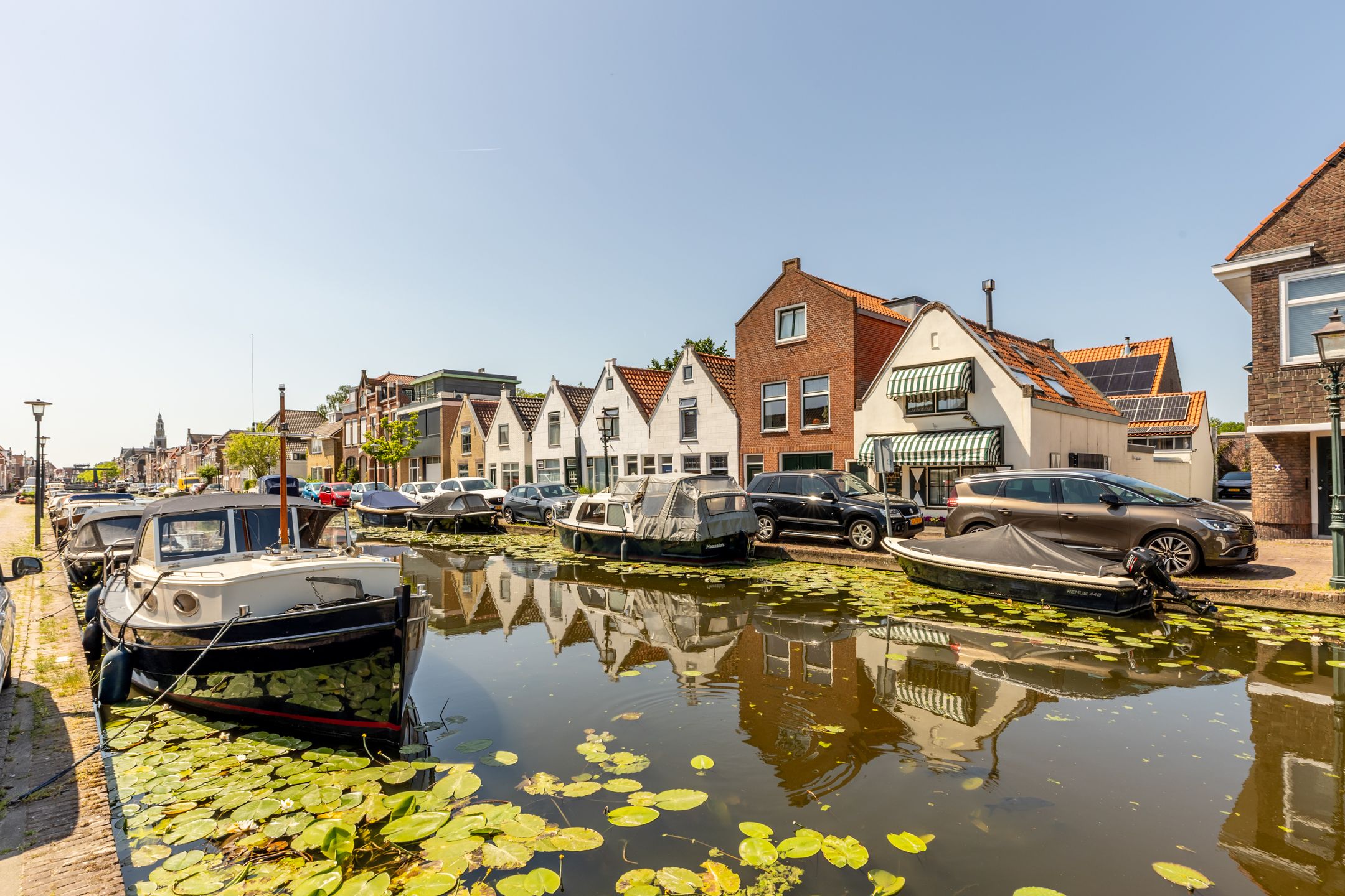 Historic Wine Warehouse Converted into Unique Canal-Side Residence with Guest Apartment and Practice Space — 78