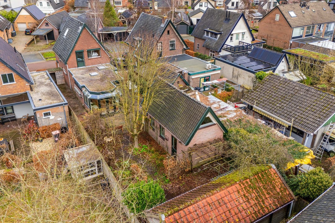 Spacious Detached Home with Versatile Outbuilding in Apeldoorn West — 32