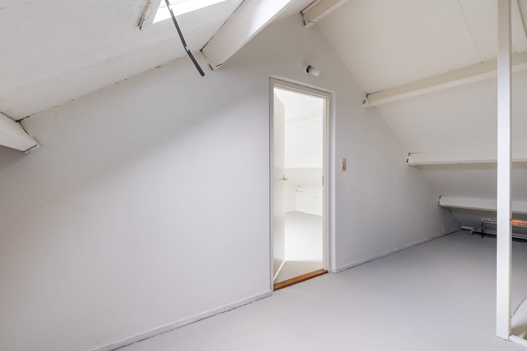 Spacious Corner Home with Four Bedrooms and Renovation Potential — 28