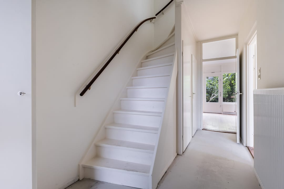 Spacious Corner Home with Four Bedrooms and Renovation Potential — 8