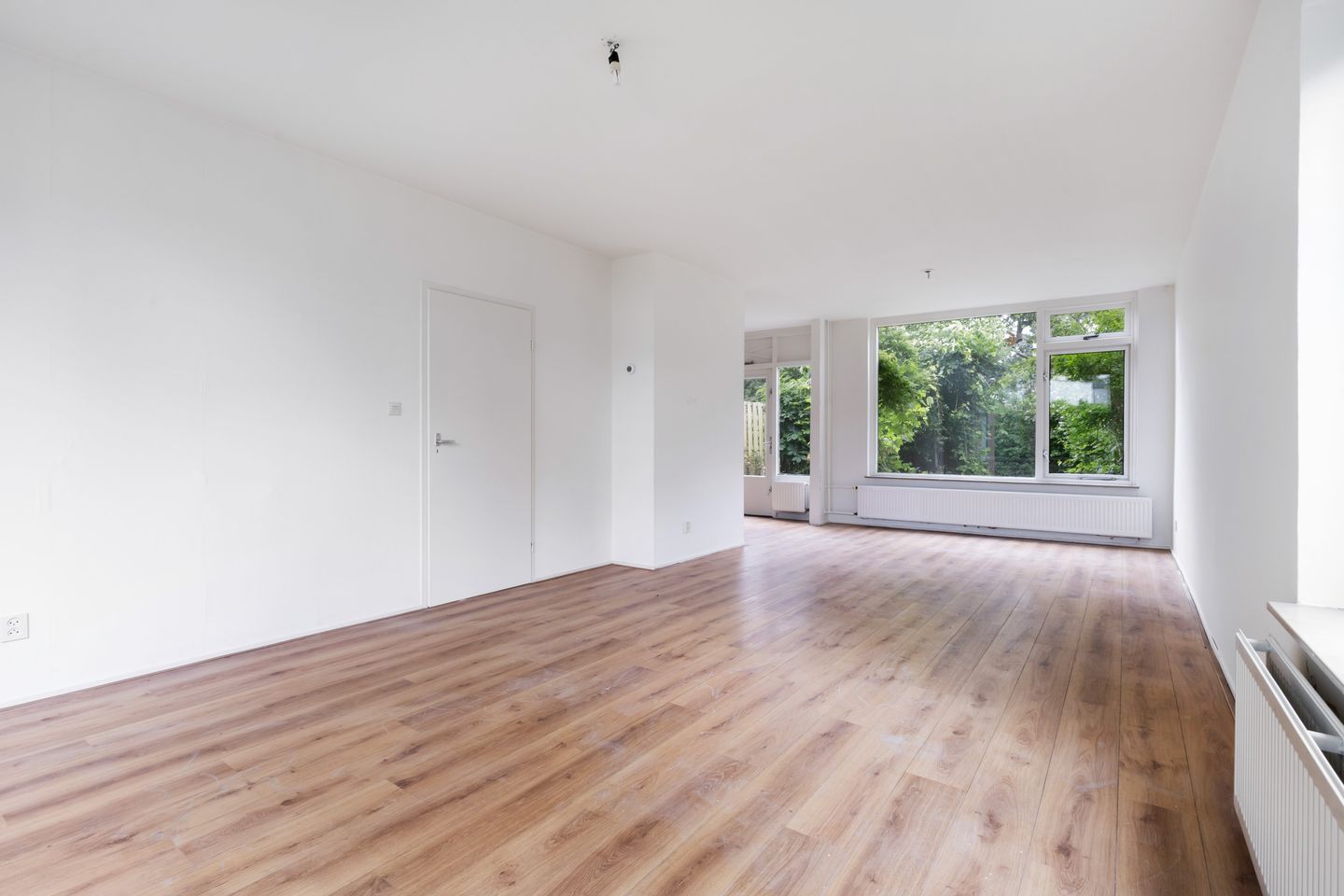 Spacious Corner Home with Four Bedrooms and Renovation Potential — 10