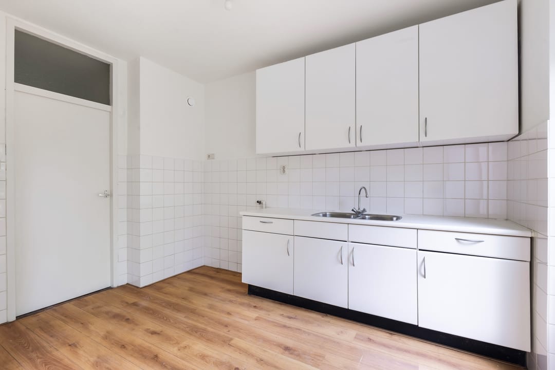 Spacious Corner Home with Four Bedrooms and Renovation Potential — 16