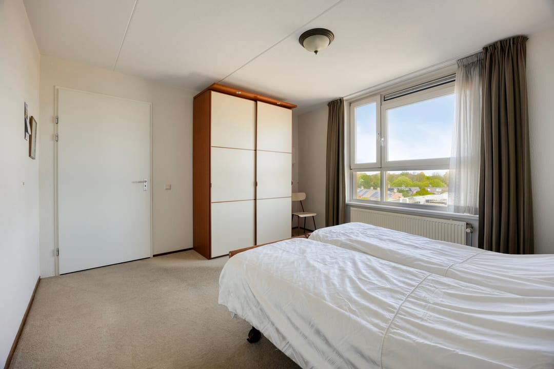 Spacious Corner Apartment with Private Parking and South East Balcony — 23