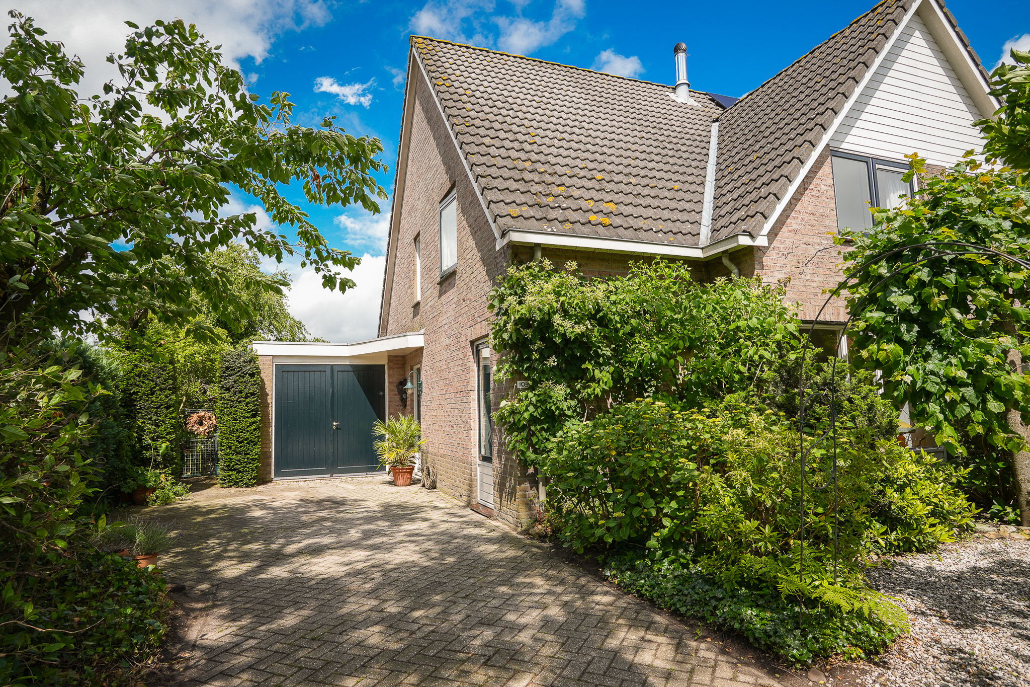 Extended Semi-Detached Home with Panoramic Orchard Views in the Betuwe — 45