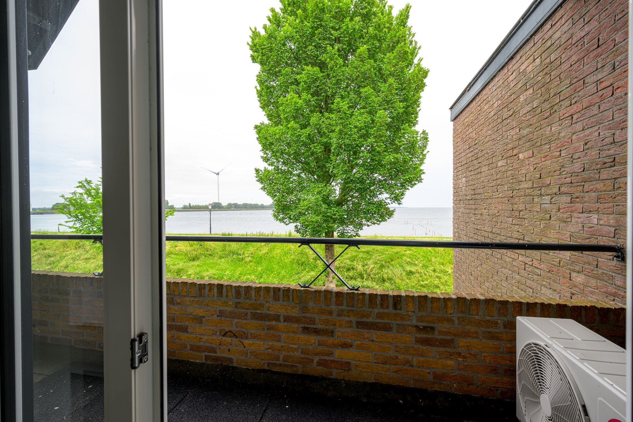 Waterfront Living with Panoramic IJsselmeer Views in Historic Medemblik — 36
