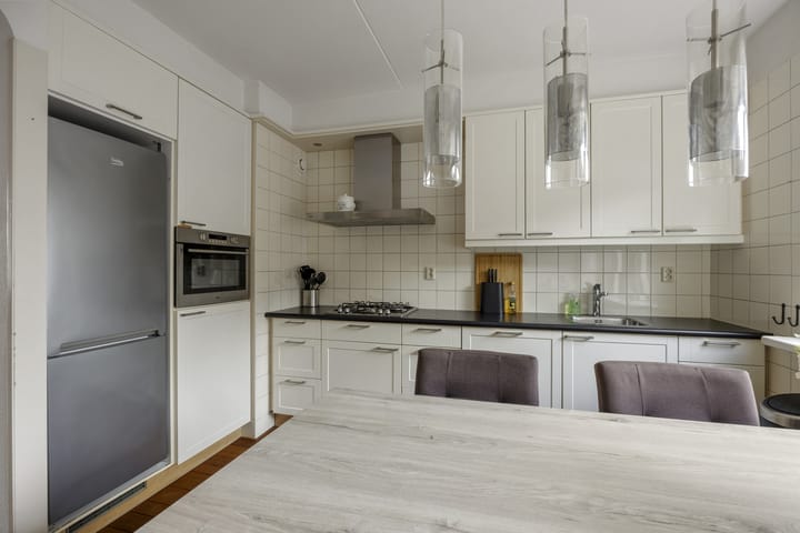 Tussenwoning te koop: Doornenburg 52, Barneveld