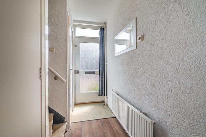 Tussenwoning te koop: M.A. de Ruyterlaan 12, Winschoten