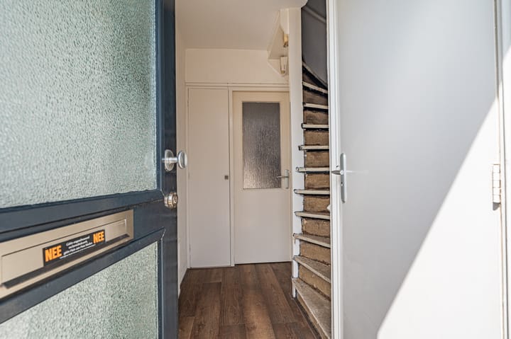 Tussenwoning te koop: M.A. de Ruyterlaan 12, Winschoten
